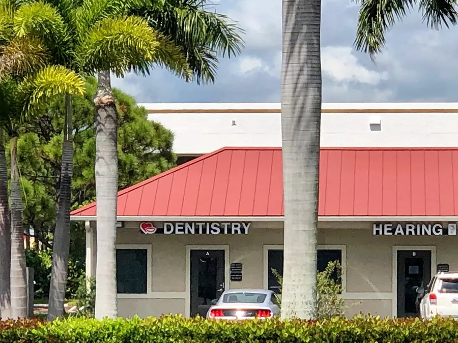 The office in Colonial Plaza on West Indiantown Road, with its red roof and Dentistry sign.