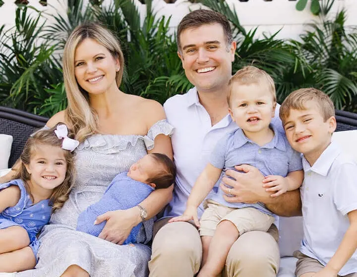 Dr. Amiee and Dr. Shane Vaughn with their three young children.