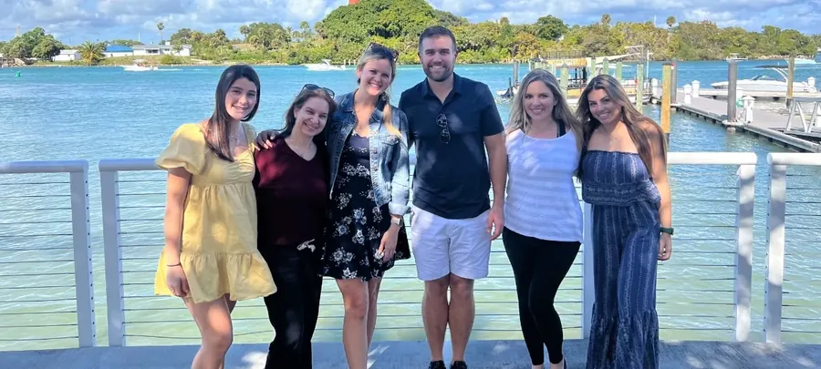 Dr. Shane, Dr. Amiee and the team together on the waterfront in Jupiter.