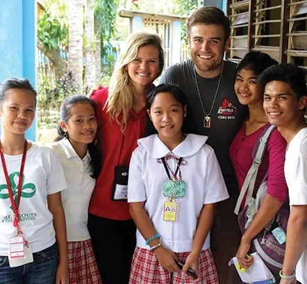 Dr. Shane and Dr. Amiee with students on a service trip to the Philippines.